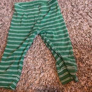 A baby girls green, white striped koala, baby pants